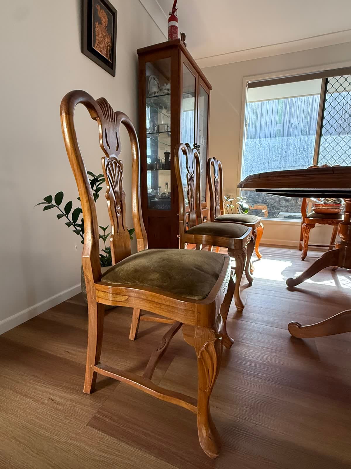 Oval Teak Dining Table and 8 Carved Chairs photo 3